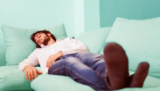 Man relaxing on his couch