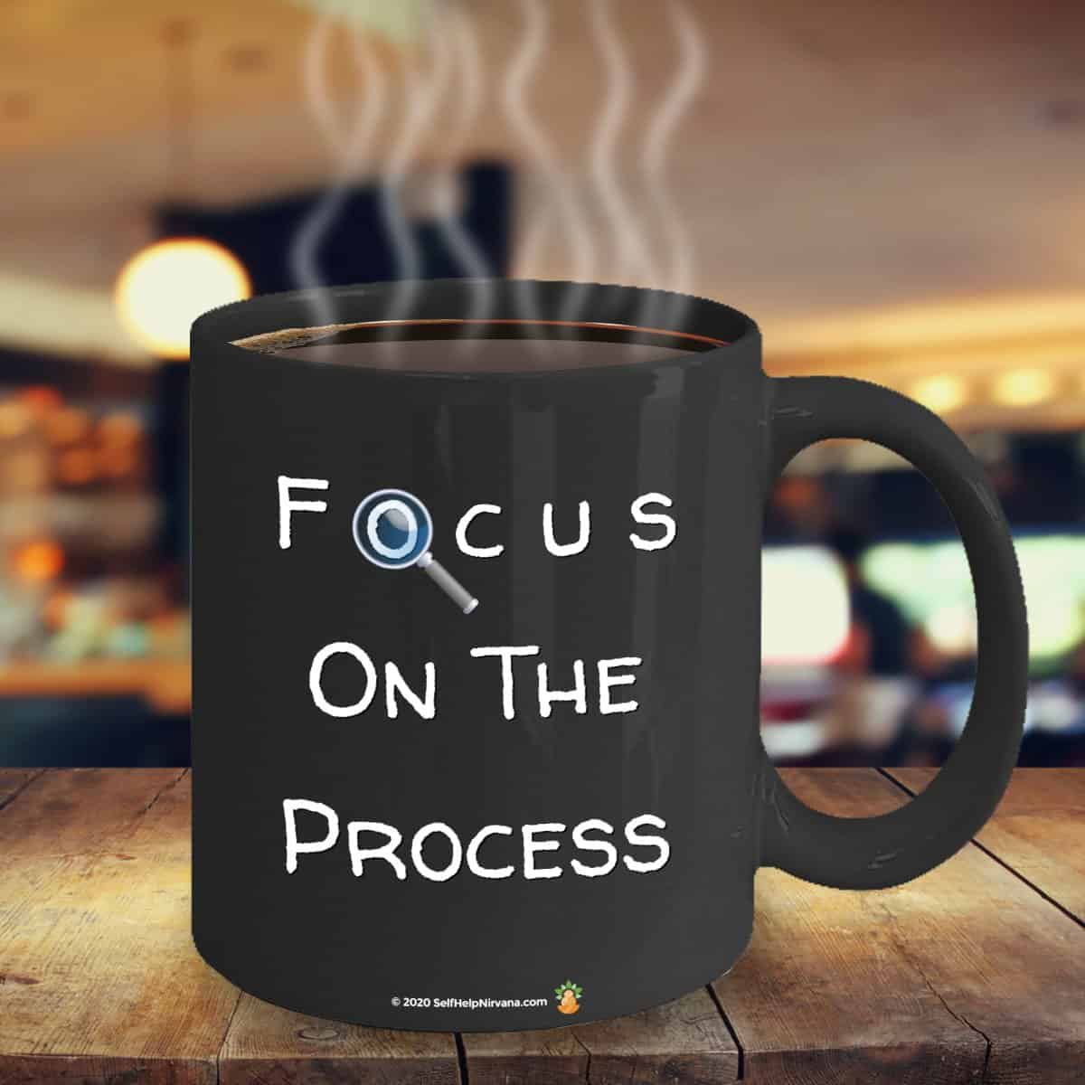 Image of a coffee cup that says Focus On The Process